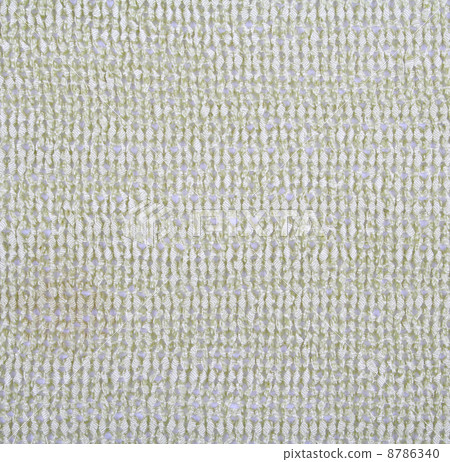 Golden knitted textured as background 8786340