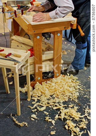 Professional carpenter makes furniture 8786807