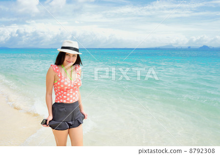 Summer beach and young lady Summer beach and young lady 8792308