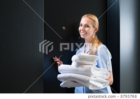 Service in the hotel, towels being changed 8793768