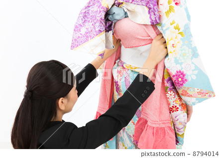 A woman in dressing A woman in dressing 8794014