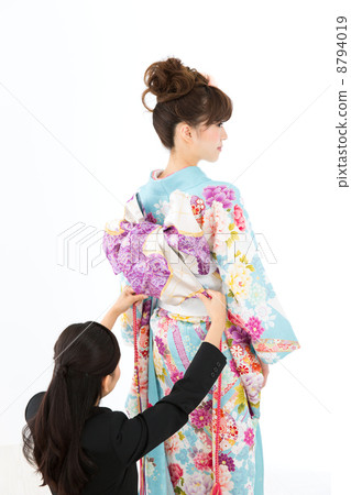 A woman in dressing A woman in dressing 8794019