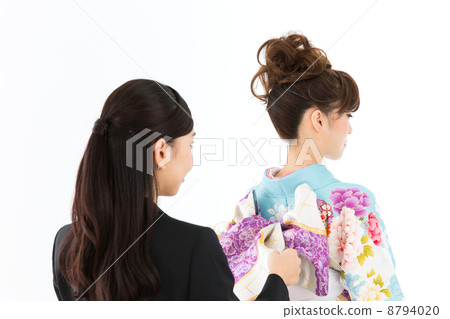 A woman in dressing A woman in dressing 8794020