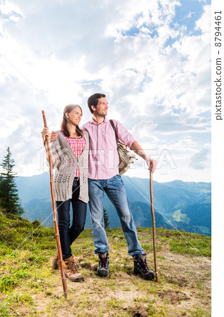 Alps - Couple hiking in the Bavarian mountains Alps - Couple hiking in the Bavarian mountains 8794461