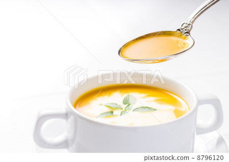 Pumpkin soup on served table Pumpkin soup on served table 8796120