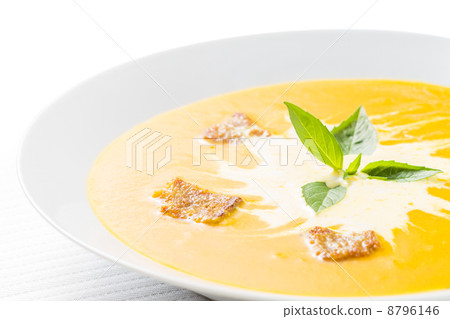 Pumpkin soup on served table 8796146