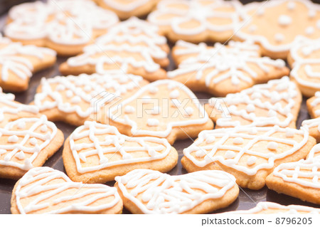 Gingerbread iced cookies on table Gingerbread iced cookies on table 8796205