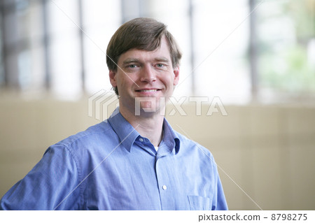 Smiling handsome businesman Smiling handsome businesman 8798275