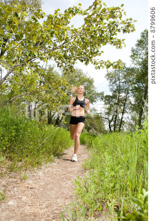 Beautiful woman jogging Beautiful woman jogging 8799606