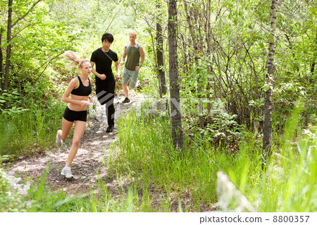 Friends running in the forest Friends running in the forest 8800357