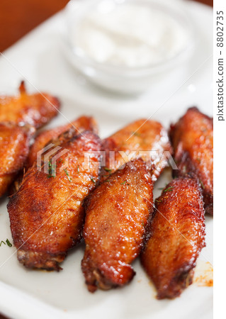 Chicken wings with sauce Chicken wings with sauce 8802735