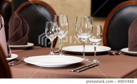 Tables set for meal Tables set for meal 8803488