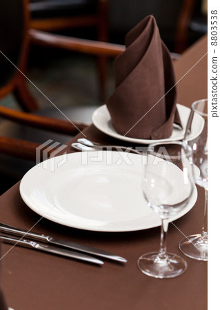 Tables set for meal Tables set for meal 8803538