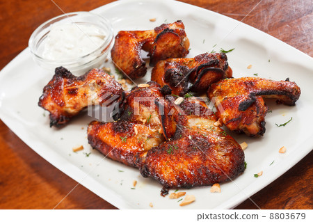 Chicken wings with sauce Chicken wings with sauce 8803679