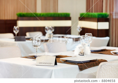 Tables set for meal 8804658