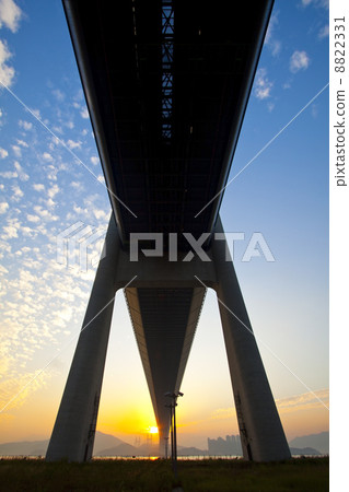 Tsing Ma Bridge landmark in Hong Kong under sunset Tsing Ma Bridge landmark in Hong Kong under sunset 8822331