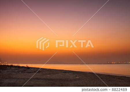 Sunset over the ocean in winter 8822489