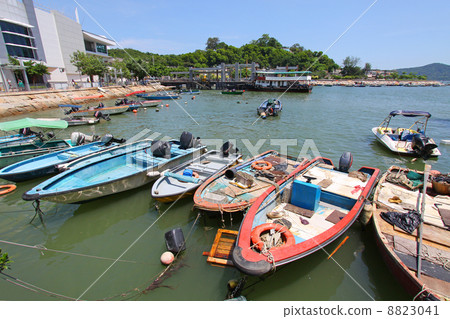 Fishing boats along the pier in Hong Kong Fishing boats along the pier in Hong Kong 8823041