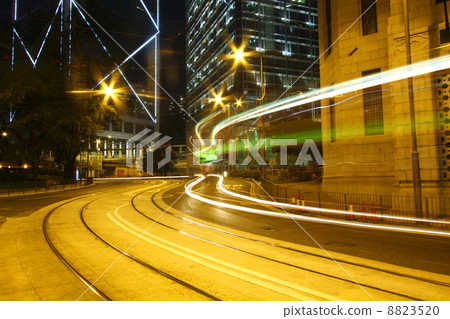 Traffic through downtown of Hong Kong at night 8823520