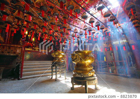 HONG KONG - JULY 26:Man Mo temple in Hong Kong with many incense HONG KONG - JULY 26:Man Mo temple in Hong Kong with many incense 8823870
