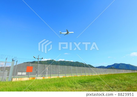 Airplane fly over grasses at day time Airplane fly over grasses at day time 8823951