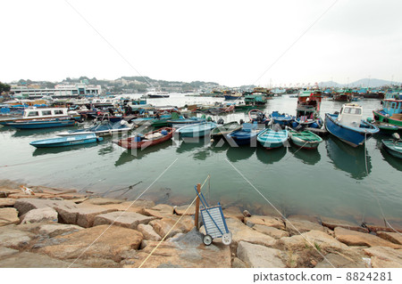 Cheung Chau sea view in Hong Kong, with fishing boats as backgro 8824281