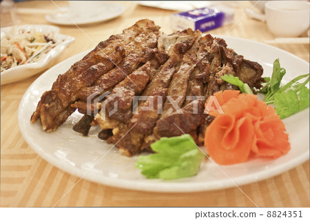 Roasted lamb on dishes Roasted lamb on dishes 8824351