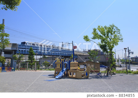 Tokyo Metropolitan Government Park and Tozai Line Train 8834855