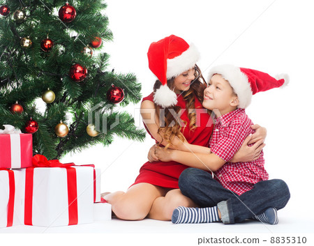 happy mother and child boy with gift boxes 8835310