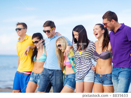 group of friends having fun on the beach group of friends having fun on the beach 8835633