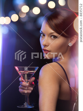 woman with cocktail 8835712