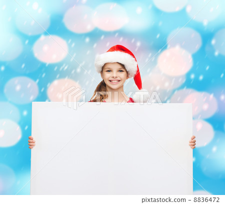 woman in santa helper hat with blank white board woman in santa helper hat with blank white board 8836472