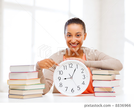 attractive woman with white clock attractive woman with white clock 8836966