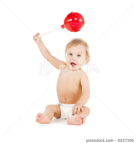 cute little boy playing with big lollipop 8837306