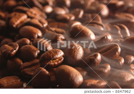 coffee beans with steam coffee beans with steam 8847962