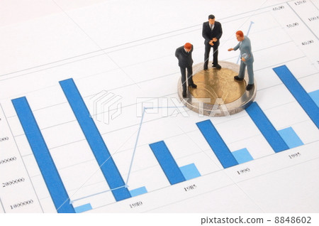 businessman and money over a chart businessman and money over a chart 8848602