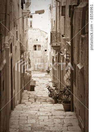 Retro photo of old street 8858961