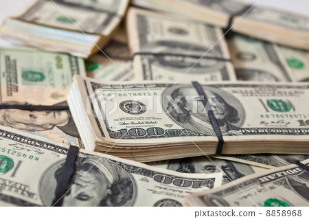 Many $ 100 banknotes Many $ 100 banknotes 8858968