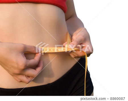 Woman measuring waist with a tape measure 8860087