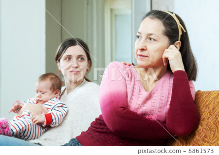 Adult daughter with baby asks for forgiveness from mother Adult daughter with baby asks for forgiveness from mother 8861573