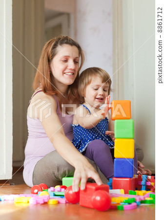 pregnant mother plays with child 8861712