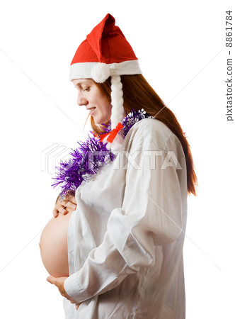 Pregnant woman in Christmas attire 8861784