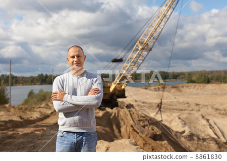 worker at sand pit worker at sand pit 8861830