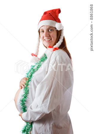 Pregnant woman in Christmas hat 8861868