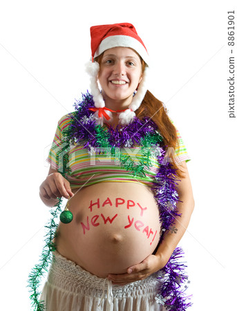 Pregnant woman in Christmas attire 8861901