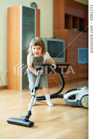 Baby girl with vacuum cleaner 8862151