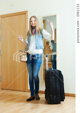 positive girl with luggage 8862152
