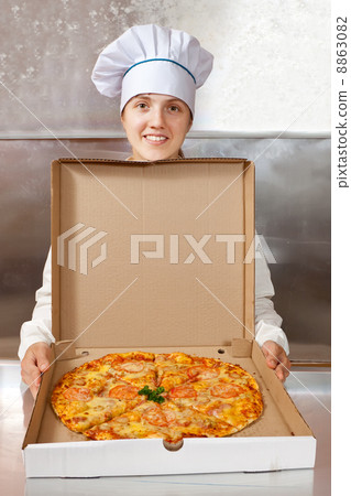 female cook with pizza in box female cook with pizza in box 8863082