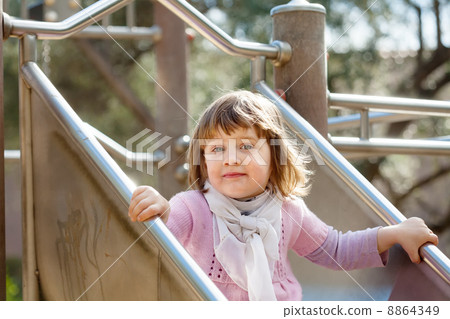 two-year child on slide two-year child on slide 8864349