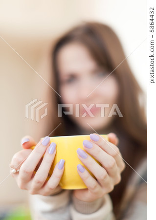 Closeup of cup in hands Closeup of cup in hands 8864432